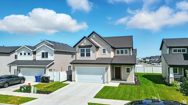 1469 W 2200 S, Wellsville, UT 84339 - view of front facade with board and batten siding, a residential view, driveway, and an attached garage