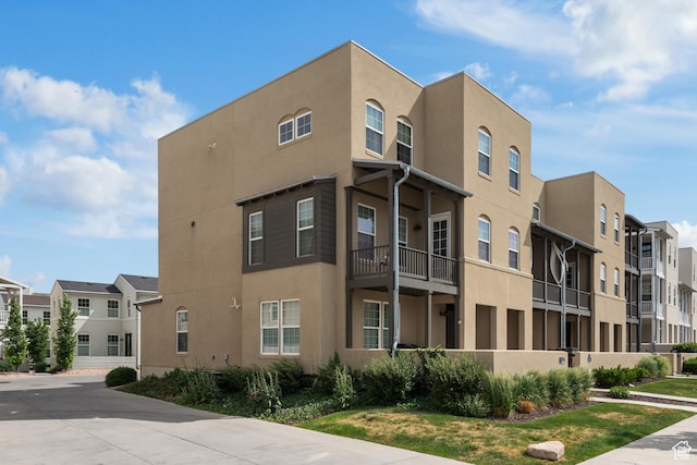 5359 W Bowstring Way Unit 358, South Jordan, UT 84009 - view of building exterior with a residential view
