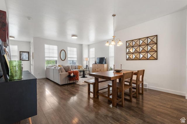 5359 W Bowstring Way Unit 358, South Jordan, UT 84009 - dining space featuring dark wood-style floors and a chandelier