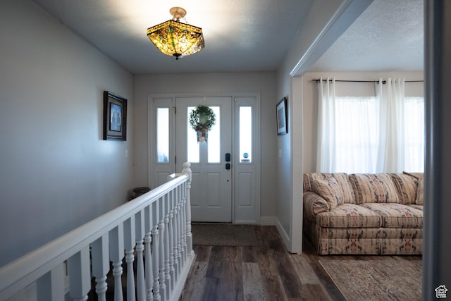 1075 E 2600 N, North Ogden, UT 84414 - foyer entrance featuring dark wood-style flooring and baseboards