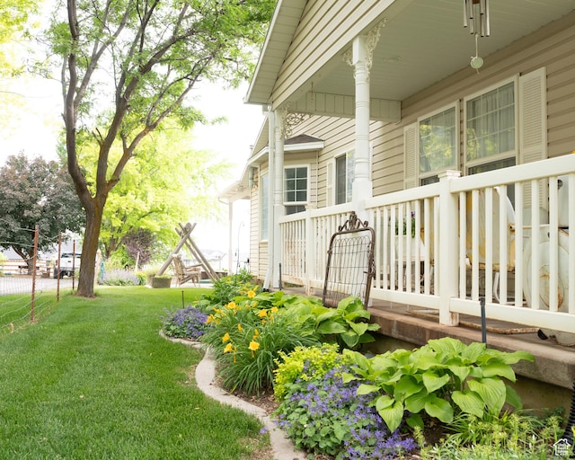1075 E 2600 N, North Ogden, UT 84414 - view of grassy yard with a porch