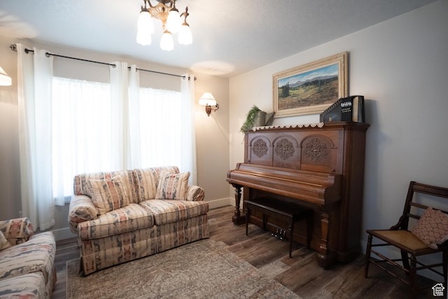 1075 E 2600 N, North Ogden, UT 84414 - living area with a chandelier and wood finished floors