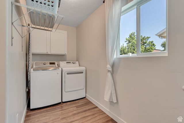442 N Cowan Cir E, Payson, UT 84651 - laundry room with plenty of natural light, independent washer and dryer, light wood-style flooring, and cabinet space