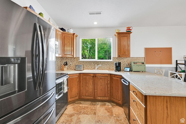 3139 N Pelican Dr, Farr West, UT 84404 - kitchen with stainless steel fridge with ice dispenser, range, a peninsula, dishwasher, and backsplash