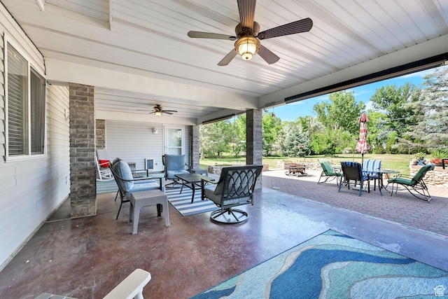 3139 N Pelican Dr, Farr West, UT 84404 - view of patio featuring ceiling fan, an outdoor living space with a fire pit, and outdoor dining area