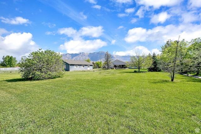 3139 N Pelican Dr, Farr West, UT 84404 - view of grassy yard with a mountain view