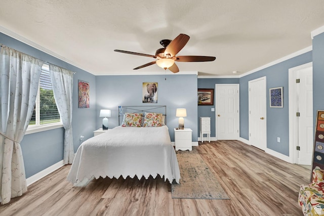 3139 N Pelican Dr, Farr West, UT 84404 - bedroom featuring crown molding, wood finished floors, and a ceiling fan