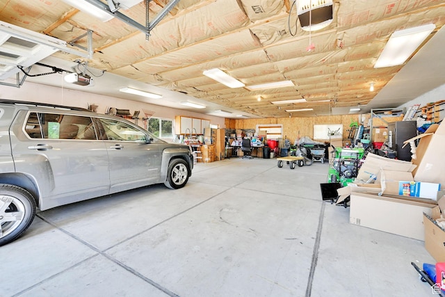 3139 N Pelican Dr, Farr West, UT 84404 - garage featuring a garage door opener