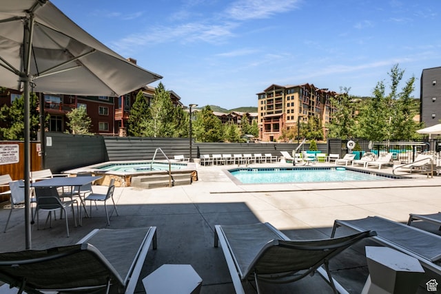 2670 Canyons Resort Dr Unit 214, Park City, UT 84098 - community pool featuring a patio area and a community hot tub