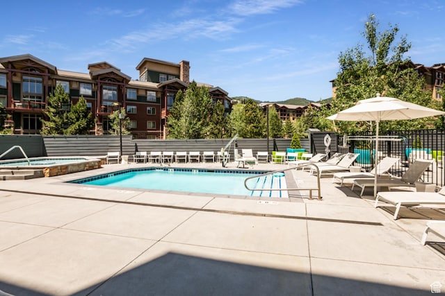 2670 Canyons Resort Dr Unit 214, Park City, UT 84098 - community pool featuring a hot tub and a patio