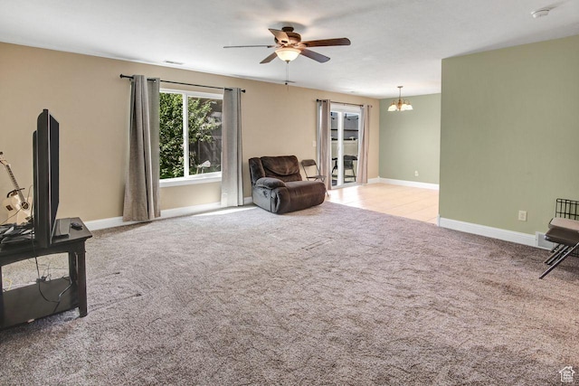 429 W 350 N Unit 4, Tremonton, UT 84337 - sitting room with ceiling fan, carpet flooring, and a chandelier