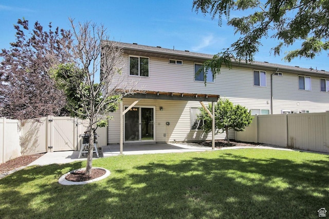 429 W 350 N Unit 4, Tremonton, UT 84337 - rear view of house featuring a gate, a fenced backyard, and a patio area