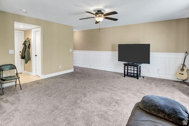 429 W 350 N Unit 4, Tremonton, UT 84337 - carpeted living area with a ceiling fan, wainscoting, and a decorative wall