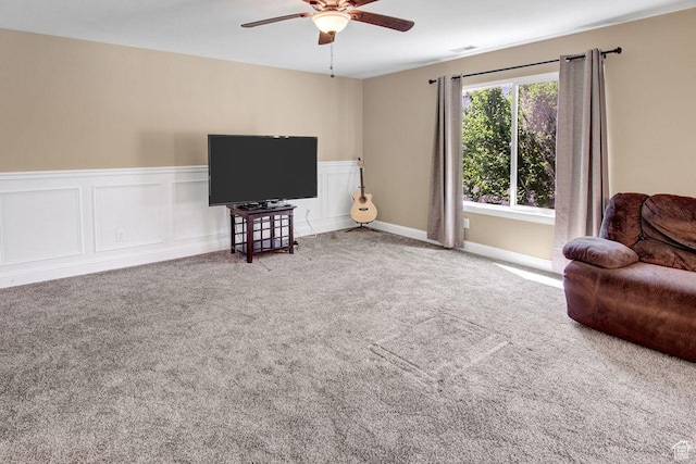 429 W 350 N Unit 4, Tremonton, UT 84337 - living area with ceiling fan, carpet floors, and a wainscoted wall