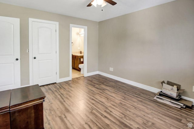 429 W 350 N Unit 4, Tremonton, UT 84337 - unfurnished bedroom with wood finished floors, ensuite bath, and a ceiling fan