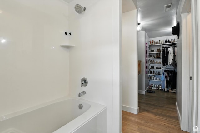 191 E 560 N, Salem, UT 84653 - full bath with wood finished floors, bathtub / shower combination, and a walk in closet