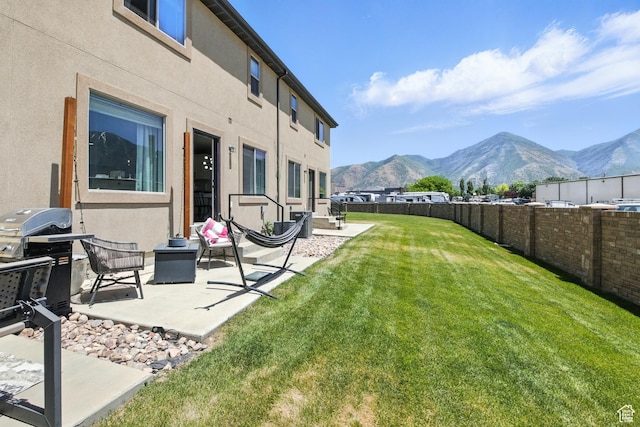 191 E 560 N, Salem, UT 84653 - fenced backyard featuring a mountain view and a patio