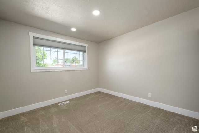 5729 S 150 W, Murray, UT 84107 - spare room featuring carpet floors, recessed lighting, and a textured ceiling