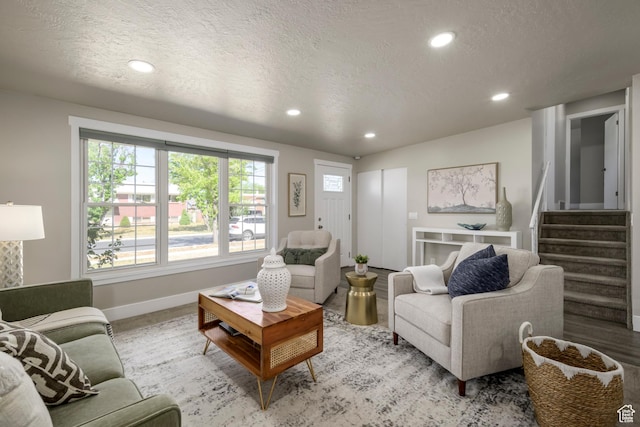 5729 S 150 W, Murray, UT 84107 - living area with a textured ceiling, recessed lighting, and stairway