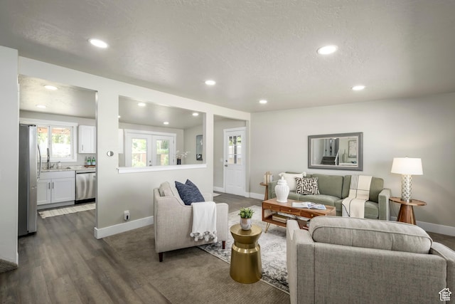 5729 S 150 W, Murray, UT 84107 - living area featuring recessed lighting, dark wood finished floors, and a textured ceiling