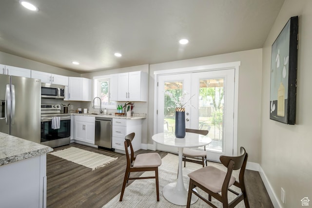 5729 S 150 W, Murray, UT 84107 - kitchen featuring stainless steel appliances, dark wood finished floors, white cabinets, french doors, and recessed lighting