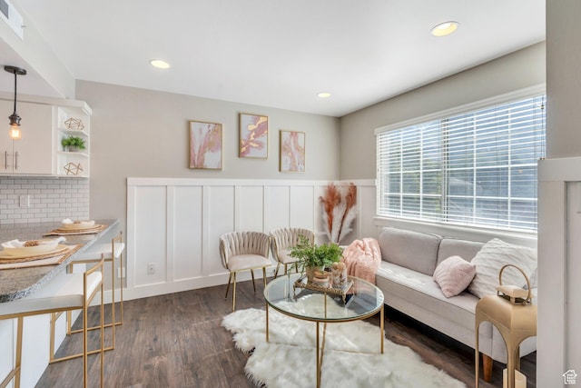 136 E 400 N Unit 207, Provo, UT 84606 - living area featuring dark wood-style floors, recessed lighting, and wainscoting