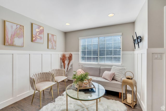 136 E 400 N Unit 207, Provo, UT 84606 - living area with a decorative wall, wainscoting, wood finished floors, and recessed lighting