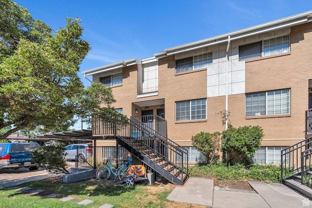 136 E 400 N Unit 207, Provo, UT 84606 - view of front of property featuring stairway and brick siding