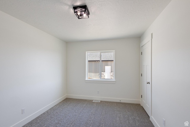 1536 N 300 E Unit 49, Nephi, UT 84648 - carpeted empty room with a textured ceiling