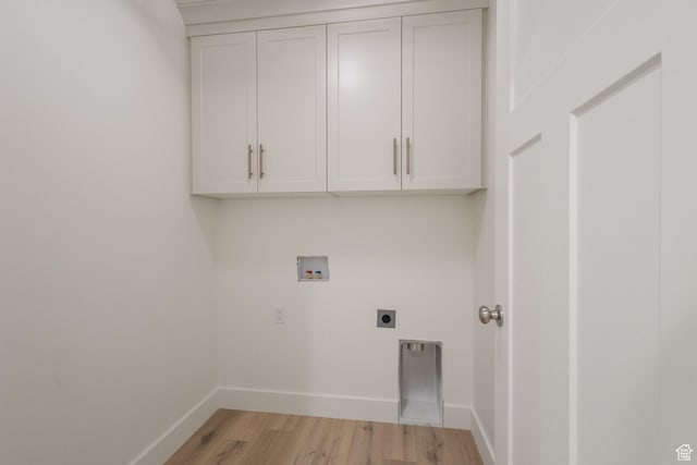 1536 N 300 E Unit 49, Nephi, UT 84648 - laundry area featuring washer hookup, hookup for an electric dryer, light wood finished floors, and cabinet space