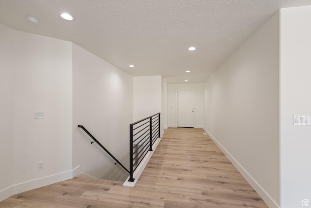 1536 N 300 E Unit 49, Nephi, UT 84648 - hallway featuring an upstairs landing, light wood-style flooring, and recessed lighting