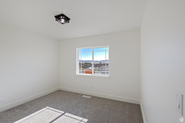 1536 N 300 E Unit 49, Nephi, UT 84648 - carpeted spare room featuring baseboards