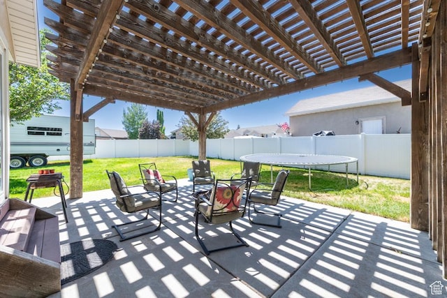 5183 W Heartland Cv, Herriman, UT 84096 - fenced backyard featuring a trampoline, a patio area, and a pergola