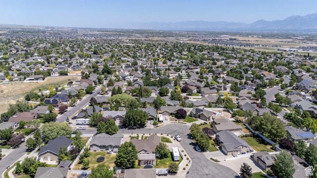 5183 W Heartland Cv, Herriman, UT 84096 - aerial view of residential area with a mountain backdrop