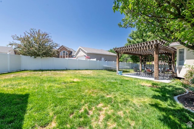 5183 W Heartland Cv, Herriman, UT 84096 - fenced backyard with a pergola, a trampoline, and a patio area