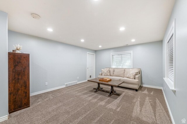 5183 W Heartland Cv, Herriman, UT 84096 - carpeted living area with baseboards and recessed lighting