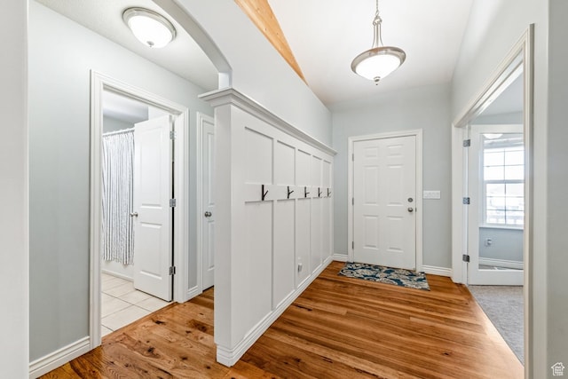 5183 W Heartland Cv, Herriman, UT 84096 - entrance foyer featuring light wood-type flooring and arched walkways