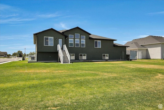 2106 W 2000 N, Farr West, UT 84404 - back of property featuring a yard and stucco siding