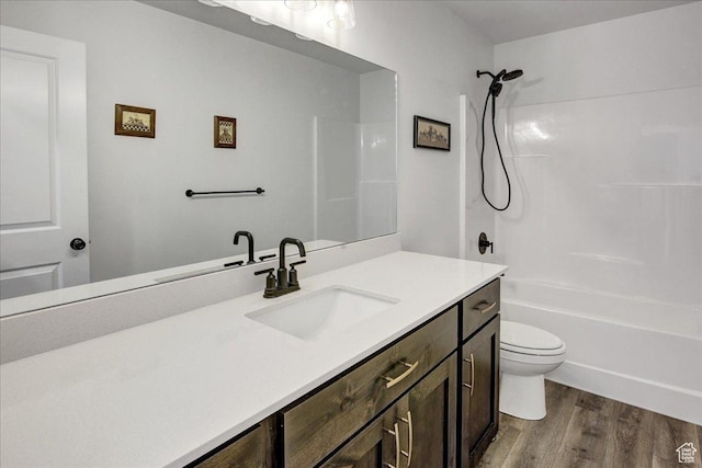2106 W 2000 N, Farr West, UT 84404 - bathroom featuring wood finished floors, vanity, and tub / shower combination