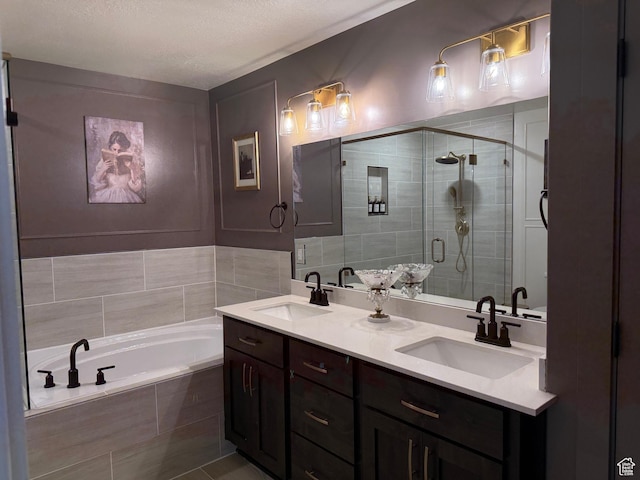2106 W 2000 N, Farr West, UT 84404 - full bathroom with double vanity, a bath, a shower stall, a textured ceiling, and tile patterned floors