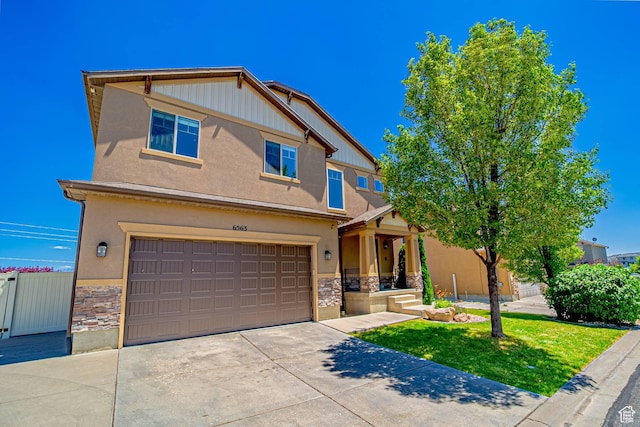 6563 S Days End Ct, West Jordan, UT 84081 - craftsman inspired home featuring stone siding, a garage, concrete driveway, and stucco siding