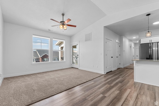 3667 W Canyon Falls Dr Unit S301, Lehi, UT 84043 - unfurnished living room featuring ceiling fan, wood finished floors, lofted ceiling, and recessed lighting