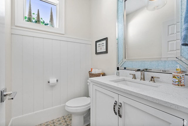 1046 W 1100 N, Pleasant Grove, UT 84062 - half bath featuring vanity, a wainscoted wall, and a decorative wall