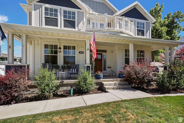 1046 W 1100 N, Pleasant Grove, UT 84062 - view of front of house with covered porch, a balcony, and board and batten siding