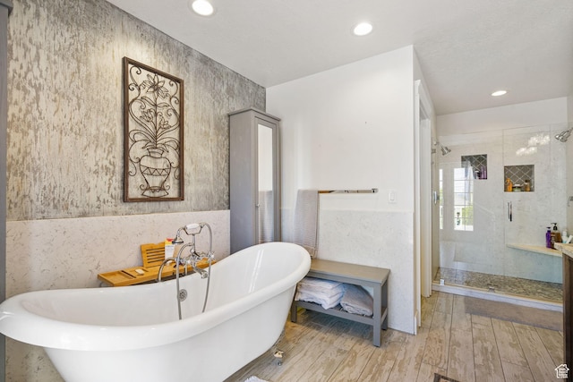 1046 W 1100 N, Pleasant Grove, UT 84062 - full bathroom with a shower stall, a soaking tub, wood finished floors, recessed lighting, and tile walls