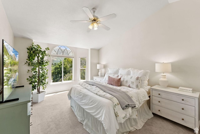 2401 N 1400 E, Layton, UT 84040 - bedroom with carpet flooring, vaulted ceiling, and a ceiling fan