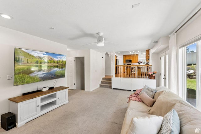 2401 N 1400 E, Layton, UT 84040 - living area featuring light carpet, stairway, ceiling fan, and recessed lighting