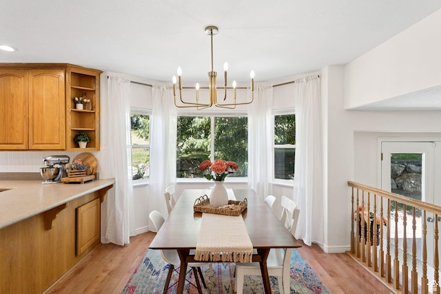 2401 N 1400 E, Layton, UT 84040 - dining area with a chandelier and light wood-style flooring