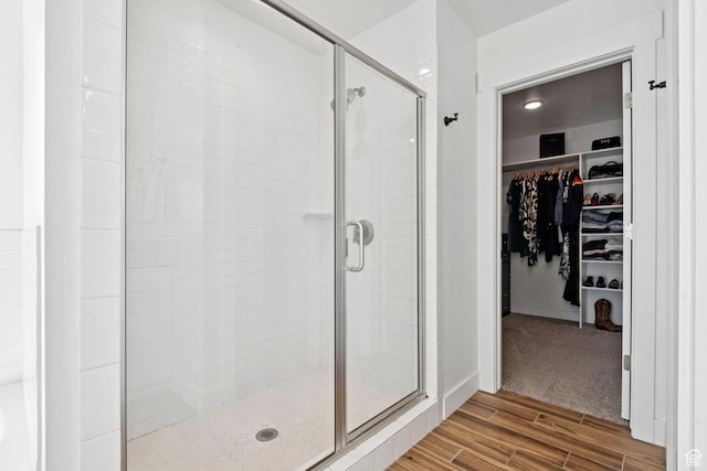 67 N 300 E, Vineyard, UT 84059 - full bathroom with a stall shower, wood finished floors, and a spacious closet
