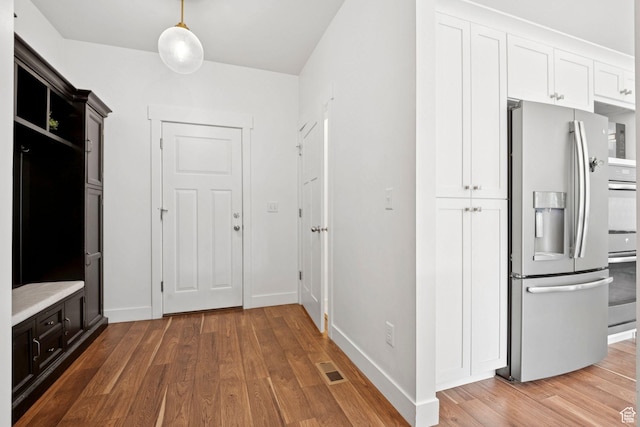 67 N 300 E, Vineyard, UT 84059 - mudroom with wood finished floors and baseboards